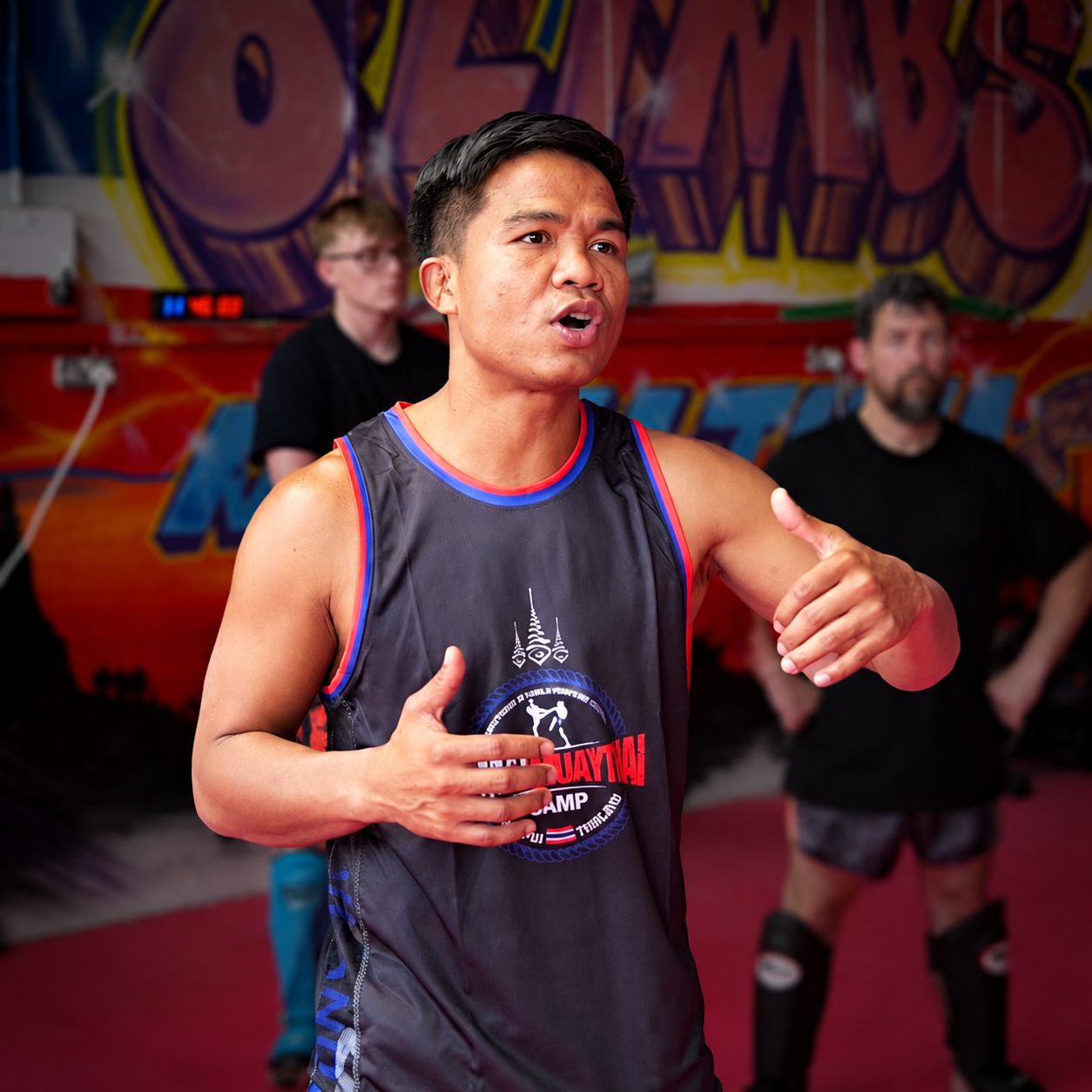 ack WMC demonstrates Muay Thai techniques during his 2026 seminar at Eight Limbs Muay Thai Academy in Birmingham.